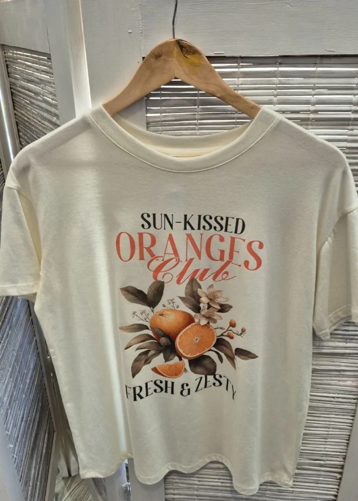Remera algodón premium, estampa naranjas