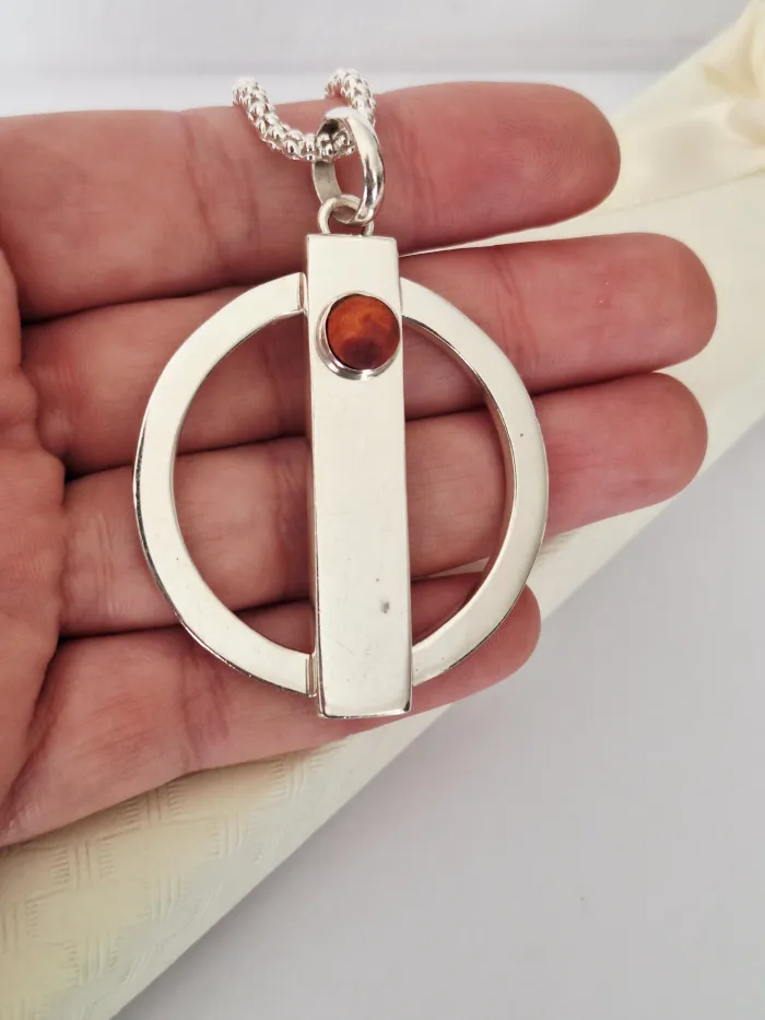 Dijes de plata