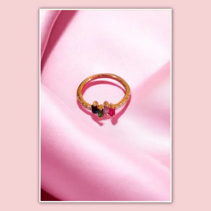 Anillo acero dorado con cubic baguette multicolor