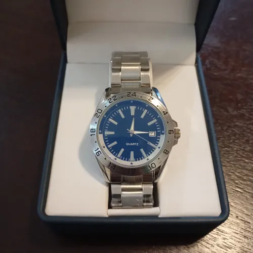 RELOJ PLATEADO FONDO AZUL + TORO POUR HOMME 2