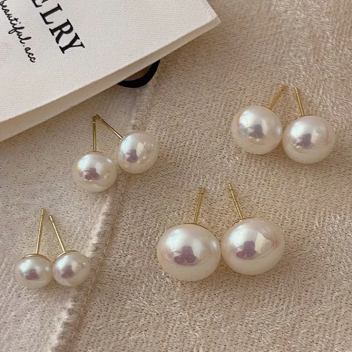 Aritos perlas blancas 