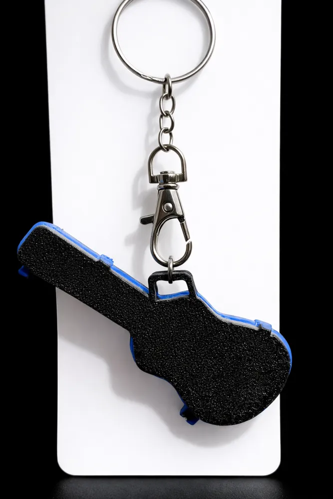 Llavero guitarra porta pua