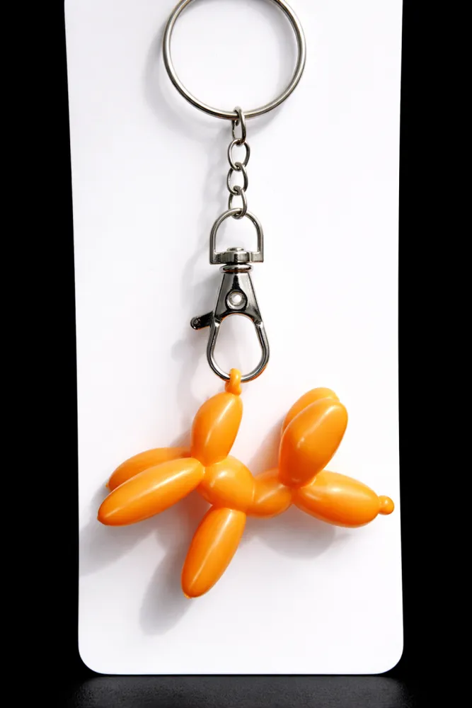 ✨ Llavero Perrito de Fiesta